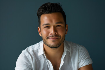Obraz premium A close up portrait of a young man with a subtle smile