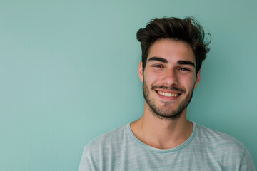 Fototapeta premium A close up portrait of a young man with a subtle smile
