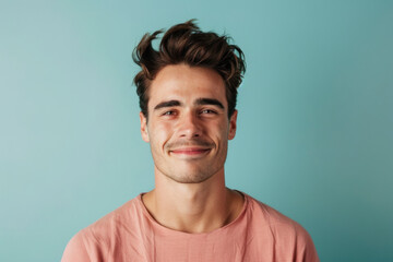 Obraz premium A close up portrait of a young man with a subtle smile