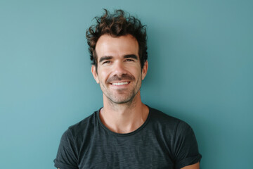 Fototapeta premium A close up portrait of a young man with a subtle smile