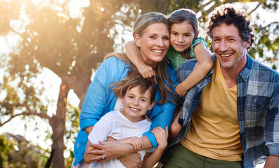 Portrait, family and hug in embrace for support, development and growth in outdoor or backyard. Woman, man and kids with comfort, child care and parenthood in bonding, relationship and connection