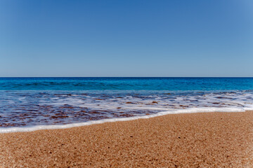 waves on the beach with sky