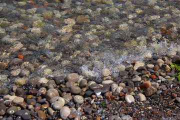 Tide on stones at a beach