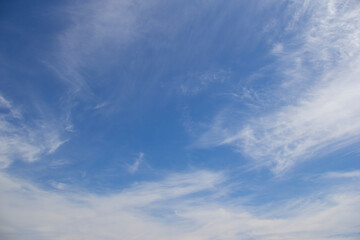 Wispy clouds in a blue sky