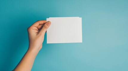 Obraz premium Hands with a voting envelope ballot in vote season.
