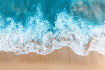 Naklejka premium Aerial View of Ocean Waves Crashing on Sandy Beach, Coastal Nature Background