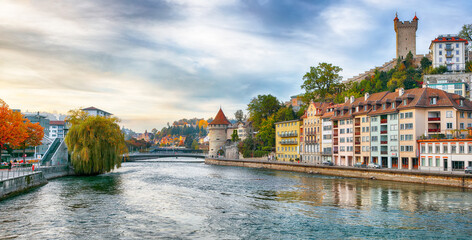 Outstanding historic city center of Lucerne with famous buildings and Nolliturm tower on Reuss...