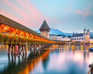 Marvelous historic city center of Lucerne with famous buildings and old wooden Chapel Bridge...