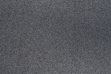 surface of a rubber hydro pad made from recycled car tires. This new modern building material for...