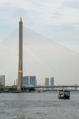 Bridge over the river with a pointy top and beautiful architecture watching over the city
