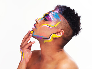 Face paint, gay pride and man in studio with thinking, inspiration or cosmetics on white...