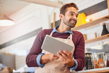 Coffee shop, small business and man on tablet for online menu, checking stock and order inventory. Restaurant, cafeteria and happy owner on digital tech for social media, networking and website