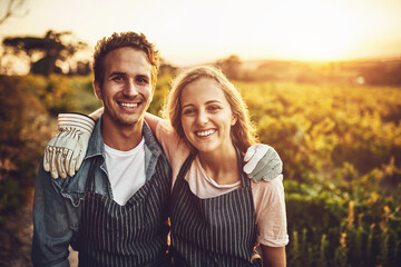 Love, hug and smile with couple on farm for agriculture, growth and wine. Teamwork, bonding and portrait with man and woman in grape field of countryside for vineyard, sustainability and environment