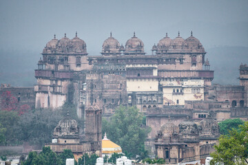 Discover the ancient indian Orchha temples surrounded by lush and green landscapes