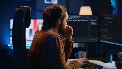Stressed engineer feeling pressed by deadline, thinking how to finish developing code on PC. IT...