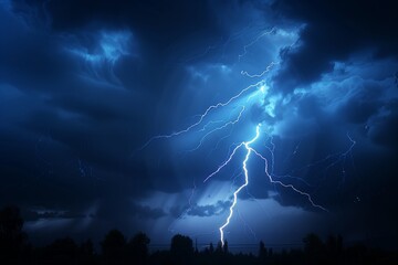 A powerful bolt of lightning illuminates the dark sky during a nighttime thunderstorm