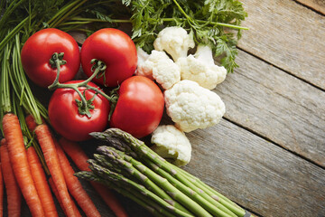 Above, desk and vegetable on wood board for healthy soup with diet, nutrition and cooking. Fresh, food and home with organic or vegetarian meal for wellness, wellbeing and self care and vegan