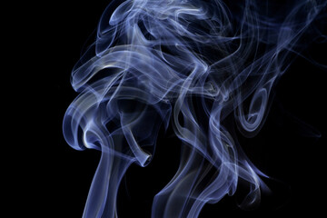 Close up of incense smoke abstract on black background