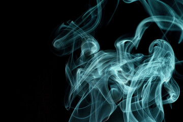 Close up of incense smoke abstract on black background