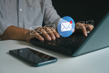 New email with notification alert, Direct selling project in customer list business for e-mail communication and email digital marketing concept. Businessman use laptop with email in virtual screen.
