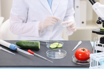 Quality control. Food inspector working in laboratory, closeup