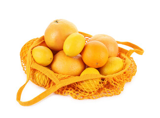 String bag with oranges and lemons isolated on white