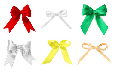 Beautiful bows of different colors isolated on white, set