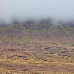 Peat mines below the clouds in Ireland