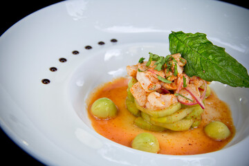 Modern mexican lobster aguachile on elegant white ceramic—spicy, citrusy, and meticulously styled...