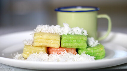 Getuk lindri. Indonesian traditional food. Steamed cassava cake sprinkled with grated coconut.    