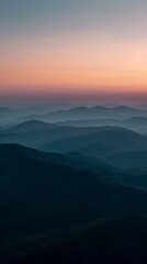 Mountain Silhouette Layers at Sunset