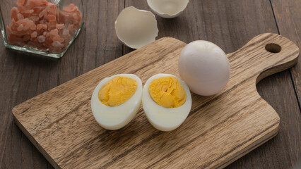 boiled eggs on a cutting board.