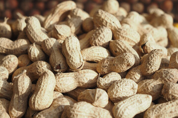 top view of Several peanuts in a basket.