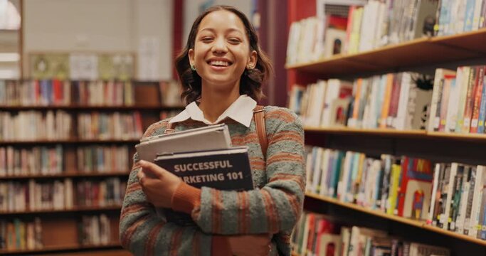 Student, girl and laughing with books in library for studying, literature research and fun learning for knowledge. Gen z, portrait and face for education with backpack, scholarship and academic info