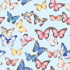 Vibrant butterfly seamless pattern with multicolored butterflies on a light blue background