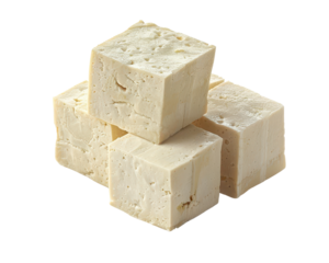 Top view of five tofu cubes stacked in a pyramid formation against a white background, highlighting texture and freshness of the tofu cubes.