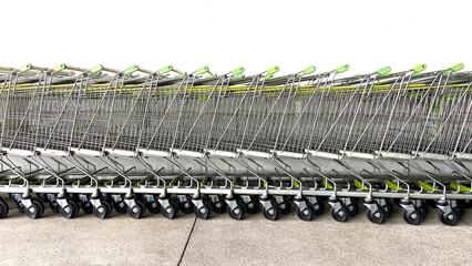 Shopping carts are stacked next to the building.