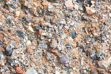 Natural orange and gray of pebbles texture background.