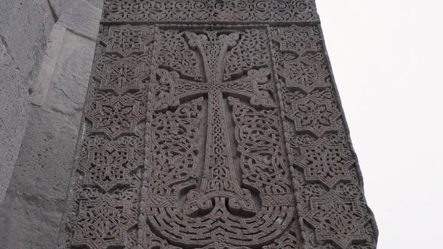 Tilt up huge, intricately carved stone khachkar, Armenian cross stele