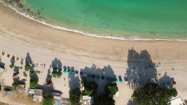 Kuta, Lombok: Aerial top down drone footage of the stunning Mawun beach near Kuta in southern Lombok in Indonesia.