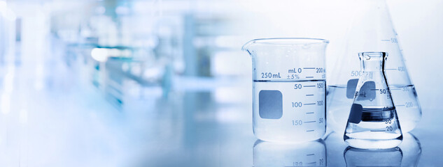 beaker and flask in chemistry science lab banner background