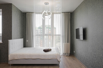 Double bed in the bedroom interior