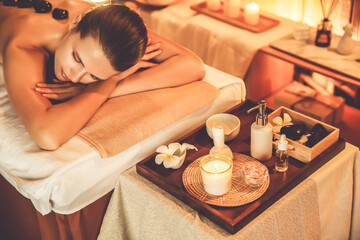 Caucasian woman customer enjoying relaxing anti-stress spa massage and pampering with beauty skin...