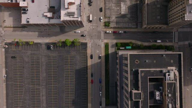 Overhead view of bustling american city intersection from a bird's eye pov, highlighting vibrant streets and buildings in downtown area