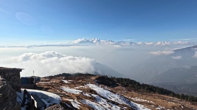 Breathtaking Ganesh Himal range with a snow-covered peaks. Time lapse of an ocean of clouds moving through the valley. View from  Lauribina, Nepal.  scenic Langtang and Gosaikunda , high Himalayan