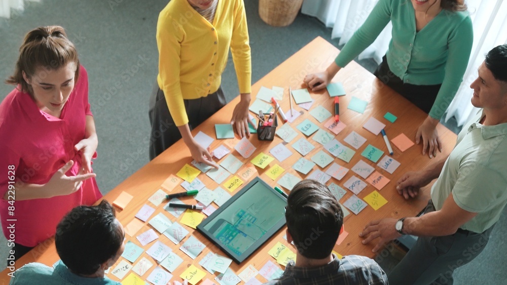 Poster top down view of smart business people shaking hands and making a contract. aerial view of architect