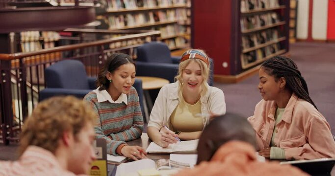 Group, students and studying in library with notes for university with teamwork. Discussion, knowledge and higher education with books, people and exam research with brainstorming on campus with help