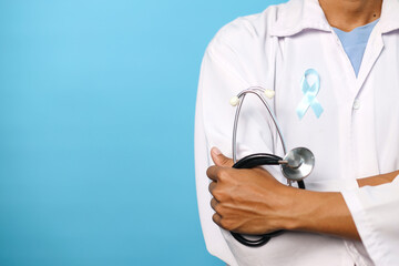 Men's Health And Prostate Cancer Awareness Campaign. Doctor Holding Stethoscope Wear Light Blue...