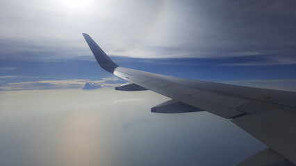 Aeroplane Wings Window View Blue Sky and Beautiful Clouds 7