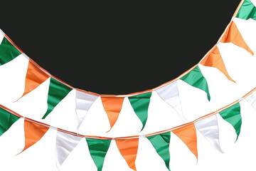 Fototapeta premium Colorful orange, white, and green pennant flags arranged in a garland, perfect for festive decorations and celebrations.